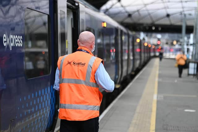 The RMT includes station staff and train conductors. Picture: John Devlin