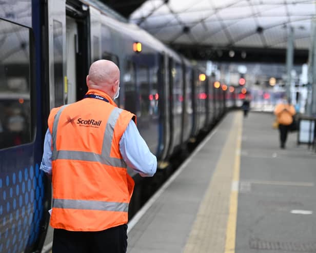 The RMT includes station staff and train conductors. Picture: John Devlin