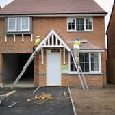 More affordable housing needs to be built to help young couples deal with the rising costs of living. (Photo by Christopher Furlong/Getty Images)