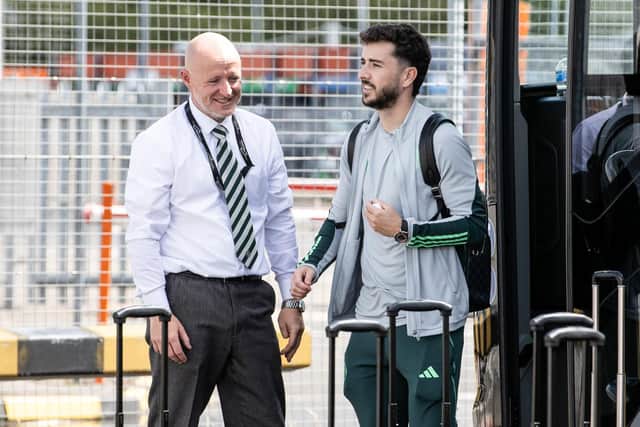 Mikey Johnston has a back injury, but has still travelled with the Celtic squad to Portugal.