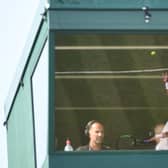 Russia's Karen Khachanov is reflected in a commentary box at Wimbledon. (Photo: OLI SCARFF/AFP via Getty Images)
