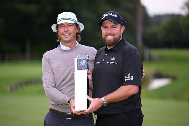 Shane Lowry and his coach, Edinburgh man Neil Manchip, celebrate the Irishman winning the BMW PGA Championship at Wentworth on Sunday. Picture: Ross Kinnaird/Getty Images.