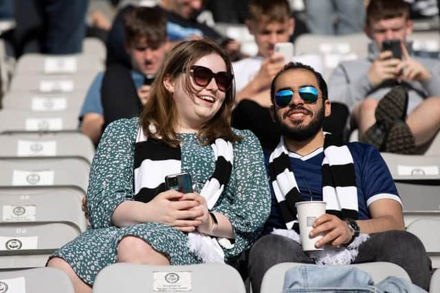 Youssef Mikhaiel and his partner, Sarah Bradley, at Queen's Park Stadium in Glasgow, before his detention.