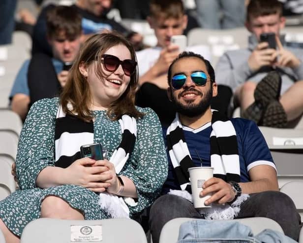 Youssef Mikhaiel and his partner, Sarah Bradley, at Queen's Park Stadium in Glasgow, before his detention.