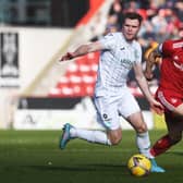 Chris Cadden is shadowed by Connor McLennan during Hibs' 2-1 defeat at Aberdeen. (Photo by Craig Foy / SNS Group)