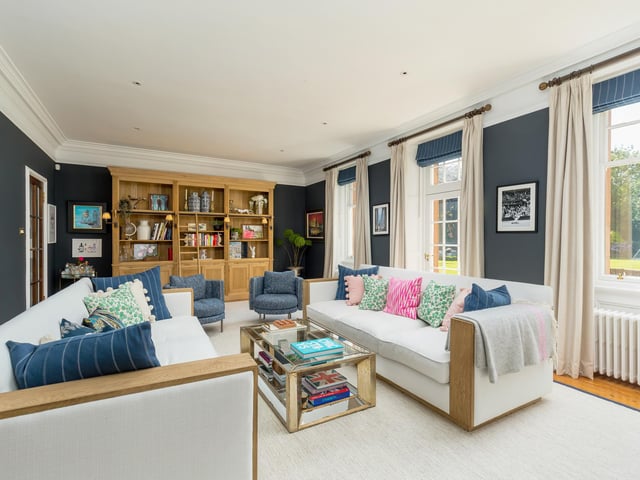 The more traditional part of the house has a family room and sitting room, and a vast study with two bay windows overlooking the garden.
A handy downstairs bedroom suite - along with a wine cellar, laundry room, pantry and boot room - means the house is very well set up for all aspects of family life.