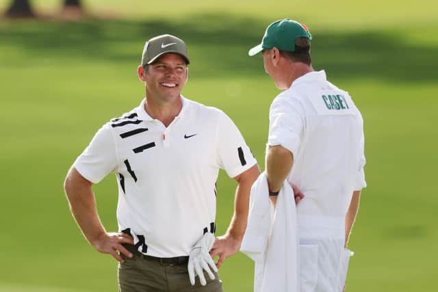 Paul Casey and caddie John McLaren talk during the first round of the Masters at Augusta National Golf Club. Picture: Rob Carr/Getty Images