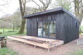 One of the cabins being built on the family’s seven acres of land, next to Galloway Forest Park.