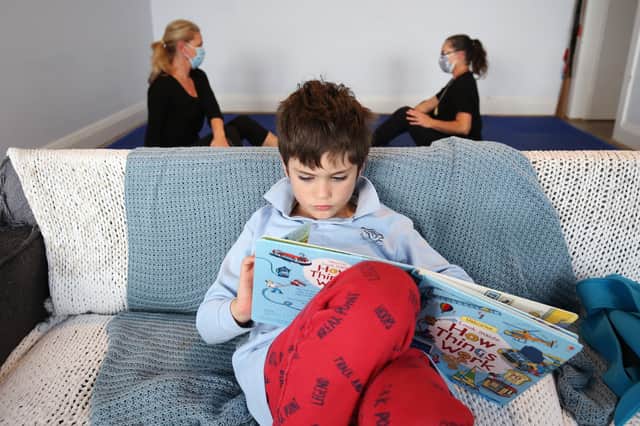 Children who enjoy reading and writing tend to be happier and are more likely to have good mental well-being (Picture: Brendon Thorne/Getty Images)