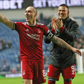 Aberdeen captain Scott Brown celebrates after his team's 2-2 draw against Rangers at Ibrox. (Photo by Alan Harvey / SNS Group)