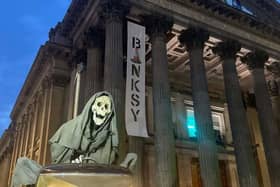 The artist's life size scythe-wielding Grim Reaper outside the Gallery of Modern Art in Glasgow. Picture: BANKSY.CO.UK/PA Wire