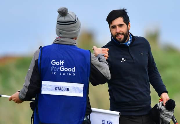 Adrian Otaegui celebrates holing the winning putt with his caddie on the 18th green during the final round of the Scottish Championship presented by AXA at Fairmont St Andrews. Picture: Mark Runnacles/Getty Images