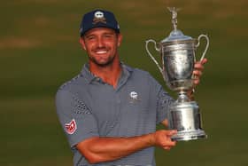 Bryson DeChambeau poses with the trophy after winning the 124th US Open at Pinehurst Resort in North Carolina. Picture: Andrew Redington/Getty Images.