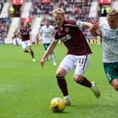 Hibs defender Ryan Porteous, right, was in good form against Hearts.