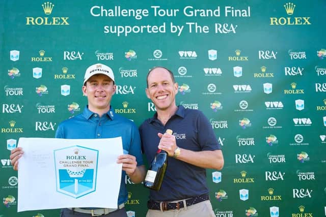 Jamie Hodges Head of Challange Tour, presents Euan Walker with his prizes for a hole-in-one in the Challenge Tour Grand Final. Picture: Aitor Alcalde/Getty Images.