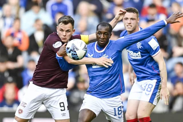 Rangers' Glen Kamara holds off Hearts' Lawrence Shankland in what may have been his last appearance at Ibrox. (Photo by Rob Casey / SNS Group)