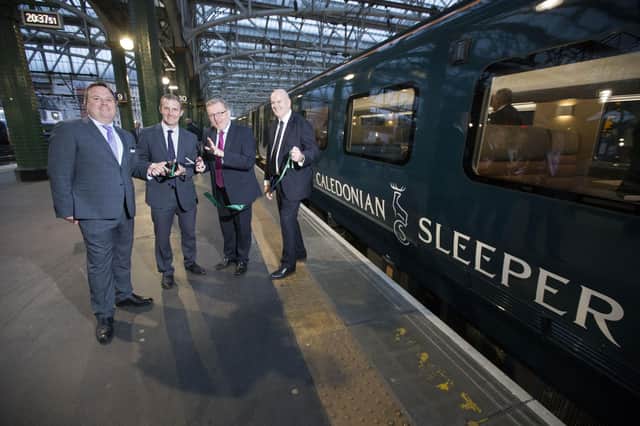 Michael Matheson, second left, with Caledonian Sleeper managing director Ryan Flaherty, then Scottish Secretary David Mundell and then Serco UK chief executive Kevin Craven at the launch of the new fleet last year