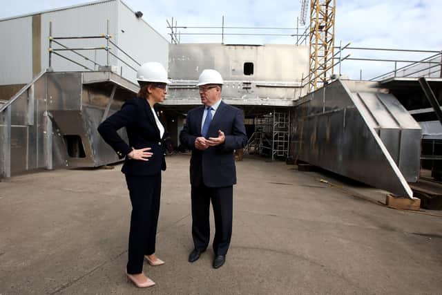 Nicola Sturgeon visits the Ferguson Marine shipyard in 2015 with the then owner Jim McColl (Picture: Andrew Milligan/PA)