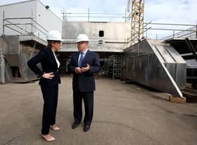 Nicola Sturgeon visits the Ferguson Marine shipyard in 2015 with the then owner Jim McColl (Picture: Andrew Milligan/PA)