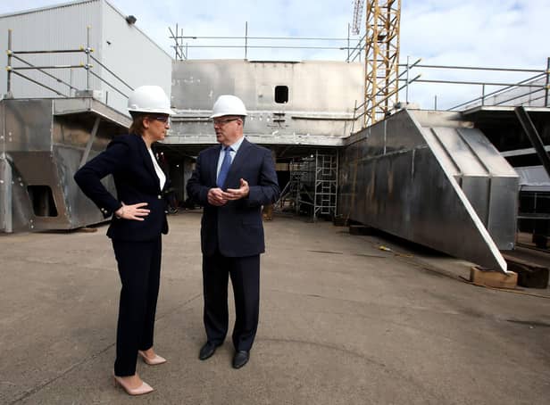 Nicola Sturgeon visits the Ferguson Marine shipyard in 2015 with the then owner Jim McColl (Picture: Andrew Milligan/PA)