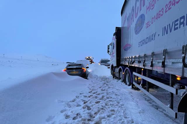 Vehicles trapped in the snowdrifts. Picture: John MacLean/PA Wire