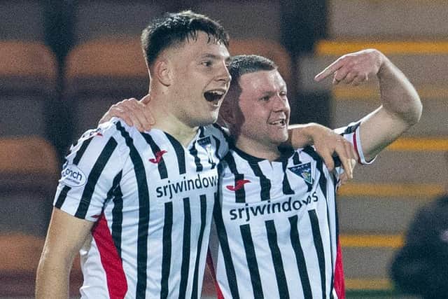Dunfermline's Josh Edwards celebrates with Dom Thomas after making it 3-1 against Partick.  (Photo by Ross Parker / SNS Group)