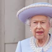 Queen Elizabeth II and the Duke of Kent watch from the balcony during the Trooping the Colour ceremony at Horse Guards Parade, central London, as the Queen celebrates her official birthday, on day one of the Platinum Jubilee celebrations.