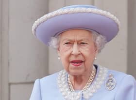 Queen Elizabeth II and the Duke of Kent watch from the balcony during the Trooping the Colour ceremony at Horse Guards Parade, central London, as the Queen celebrates her official birthday, on day one of the Platinum Jubilee celebrations.