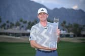 Nick Dunlap poses with the trophy after winning The American Express in La Quinta, California. Picture: Orlando Ramirez/Getty Images.