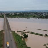 A truck carries local residents while driving to safer ground last month away from the rising waters in Numan Community of Adamawa State in North East Nigeria.