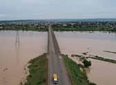 A truck carries local residents while driving to safer ground last month away from the rising waters in Numan Community of Adamawa State in North East Nigeria.