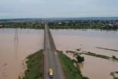 A truck carries local residents while driving to safer ground last month away from the rising waters in Numan Community of Adamawa State in North East Nigeria.