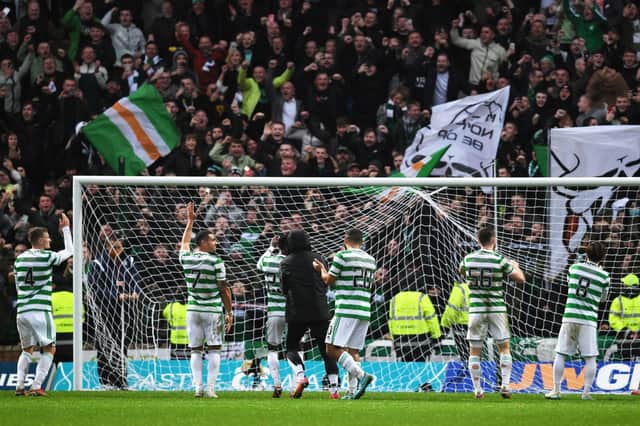 Celtic players take the acclaim of the visiting support. (Photo by Craig Foy / SNS Group)