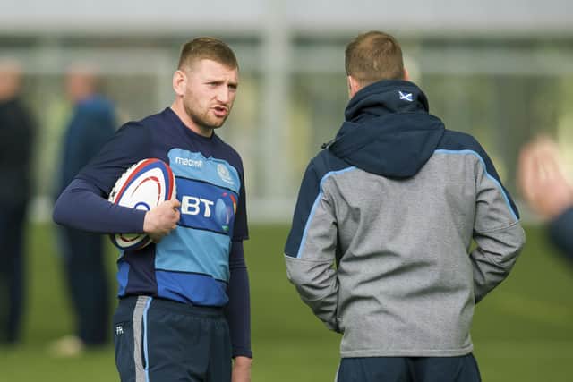 Finn Russell speaks with Chris Paterson during a Scotland training session. (Picture: SNS Group / Bruce White)