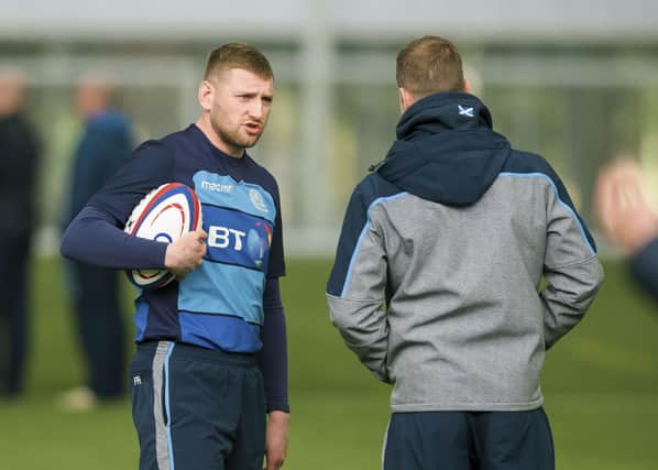 Finn Russell speaks with Chris Paterson during a Scotland training session. (Picture: SNS Group / Bruce White)