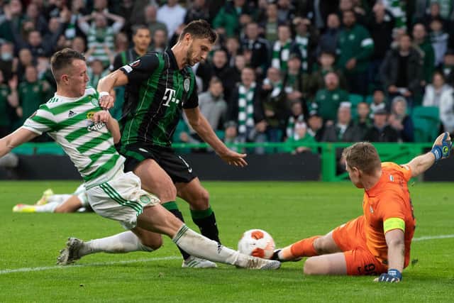 David Turnbull lunges for the ball as Celtic go 2-0 ahead in their Europa League encounter with Ferencvaros.