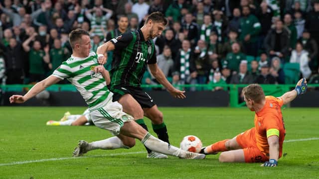 David Turnbull lunges for the ball as Celtic go 2-0 ahead in their Europa League encounter with Ferencvaros.