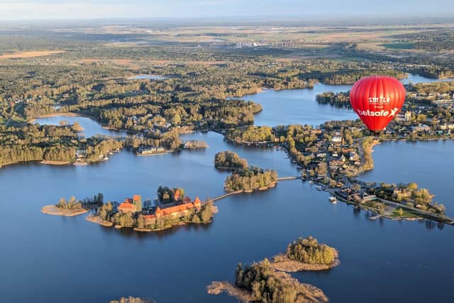 Lake Galve, Lithuania, is home to the fairytale-esque Trakai Castle. Pic: Ed Elliot/PA.