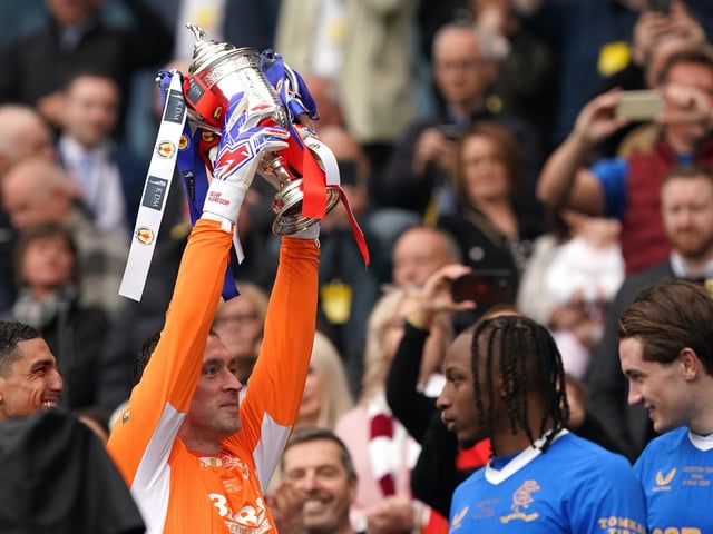 Rangers goalkeeper Allan McGregor lifts the trophy