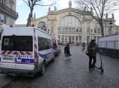 A police car parks outside the Gare du Nord train station, Wednesday, Jan. 11, 2023 in Paris. French media are reporting that people have been stabbed at a Paris train station and the interior minister says several people were injured before police "rapidly neutralized" the attacker. (AP Photo/Michel Euler)