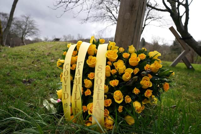 A wreath sits at Scotland's Covid Memorial in Glasgow to mark third anniversary of Covid-19 pandemic as part of the National Day of Reflection. Picture date: Thursday March 23, 2023.