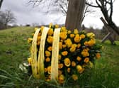 A wreath sits at Scotland's Covid Memorial in Glasgow to mark third anniversary of Covid-19 pandemic as part of the National Day of Reflection. Picture date: Thursday March 23, 2023.