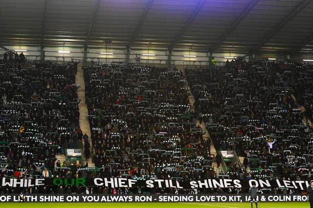 Hibs fans belt out "Sunshine on Leith" in memory of Ron Gordon.