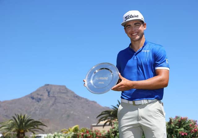 Garrick Higgo poses with the trophy after winning the Canary Islands Championship at Golf Costa Adeje in Tenerife. Picture: Andrew Redington/Getty Images.