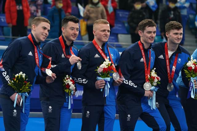 Great Britain's curlers Ross Whyte, Hammy McMillan, Bobby Lammie, Grant Hardie and Bruce Mouat with their silver medals.
