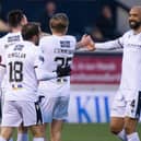 Dundee celebrate their 3-0 win at Raith.