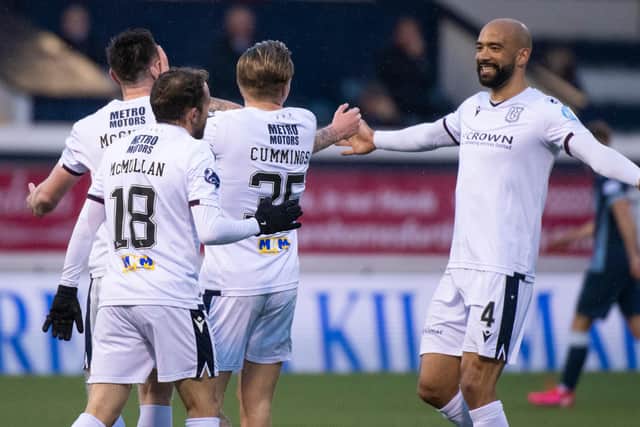 Dundee celebrate their 3-0 win at Raith.
