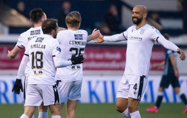 Dundee celebrate their 3-0 win at Raith.