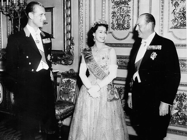 The Duke of Edinburgh, Queen Elizabeth II and King Olav of Norway at the gala performance of the play 'Rob Roy' in the Lyceum theatre Edinburgh during the King's state visit in October 1962.