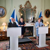 Former First Minister Nicola Sturgeon announced the Bute House power-sharing agreement with the Scottish Greens co-leaders Patrick Harvie and Lorna Slater (Picture: Jeff J Mitchell/pool/Getty Images)